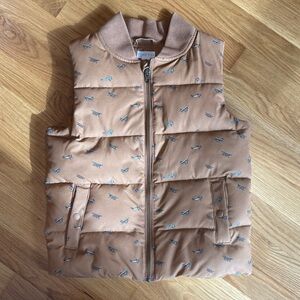 Jamie Kay Tan Puffer Vest with Airplane Print